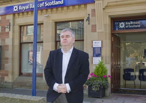 Leaderdale and Melrose councillor David Parker outside Melrose's Royal Bank of Scotland branch.