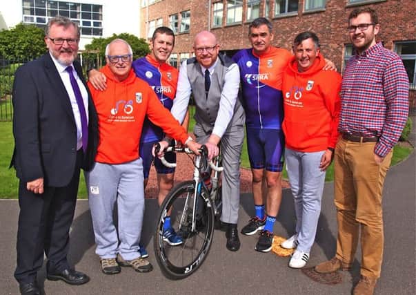 The Cycle to Syracuse team with Scottish Secretary and Borders MP David Mundell, left, and Dumfriesshire MSP Oliver Mundell, right.