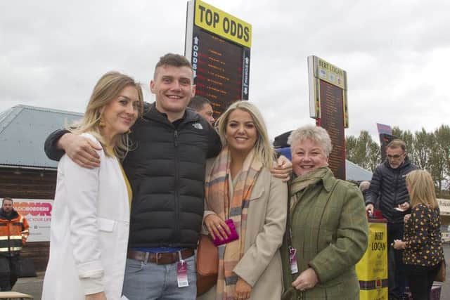 Jedburgh Callant Nick Arnold having a bet on his favourite principal at Kelso, with Marie Gallagher, Chloe Wight and Carol Marshall.