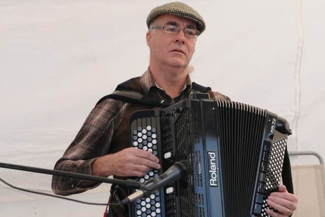 Bob Liddle plays in the Market Place.