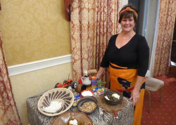 Jess Talbot dressed for the occasion when she spoke to Galashiels Rotarians.
In an outfit local to her talk, members sampled Zambian food.