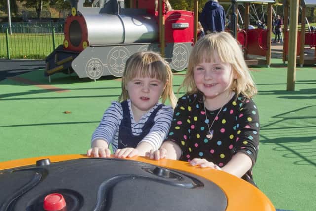 Zara and Amber Lavin, of Peebles, playing in the new playpark in Galashiels.