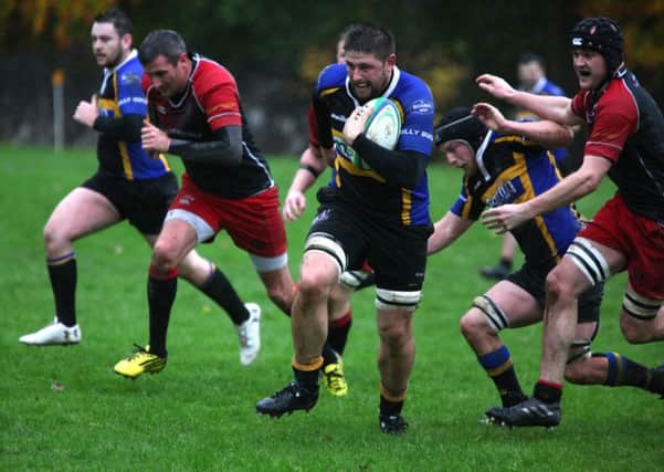 Rory Smith of Hawick Harlequins charges towards the Duns line (picture by Steve Cox).