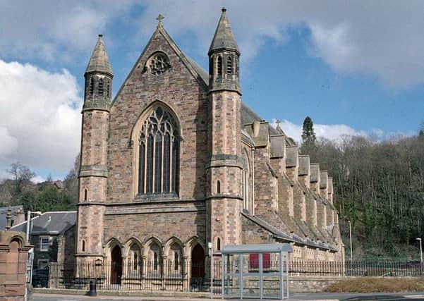 The church, in Stirling Street, Galashiels, with the priest's accommodation, left.