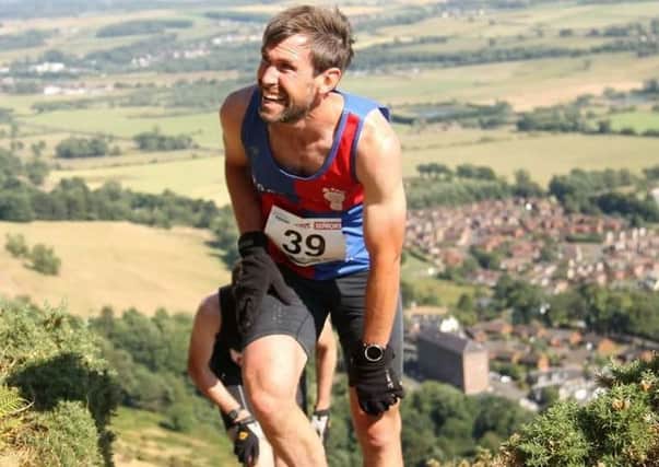 Andy Cox of Moorfoot Runners on the Alva hill run.