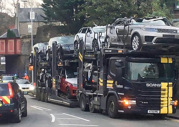 The two vehicles at the back of the top row of the lorry were destined for customers in the Borders.