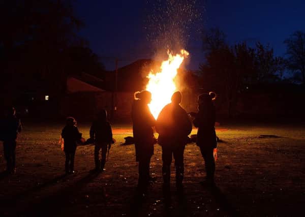 Village residents see the bonfire as a great way just to get together and enjoy the evening.