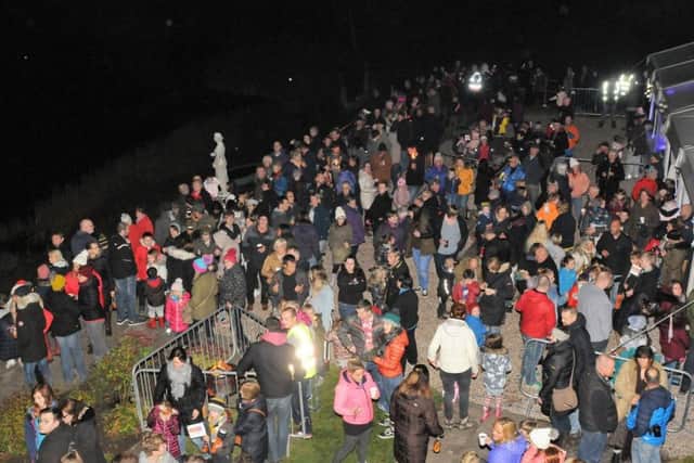 Hundreds gather beside the Haining loch to enjoy the display.