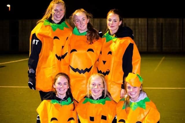 These pumpkin-clad players carved out a lot of chances when playing hockey on the fancy dress family fun night.