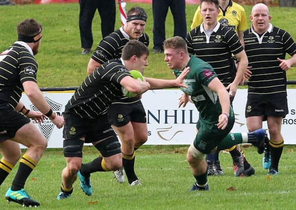 Close, tense action between Melrose and Hawick (picture by Douglas Hardie)