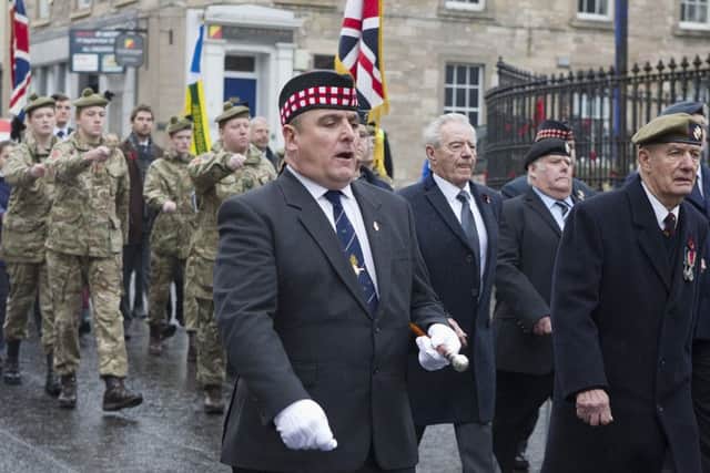 Jedburgh Legion chairman Shaun Carroll brings the parade to a halt at the end of the parade,