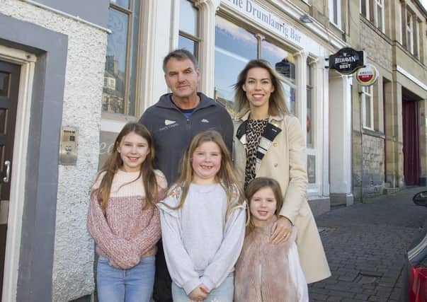 Stuart and Caja Sharkey at Hawick's Drumlanrig Bar with daughters Lily, Lola and Ruby.