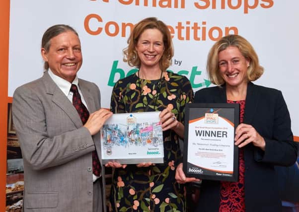 Rosamund De La Hey with John Norrie of sponsor Boost loyalty app and Ruth George MP, chair of the parliamentary group on small shops. Photograph by Simon Jacobs