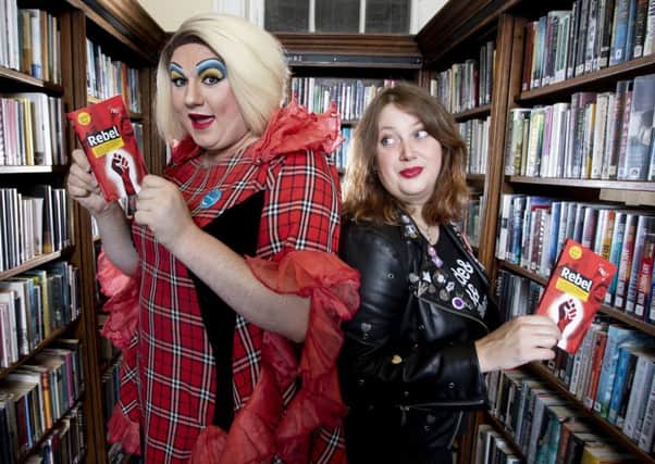 Rebellious move...Nancy Clench and author Claire Askew enjoy a sneak peek of the Rebel anthology, ahead of its launch for Book Week Scotland this year.