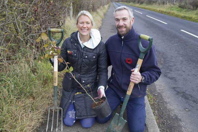 Alexandra and Philip Church from St Boswells planting on the avenue.