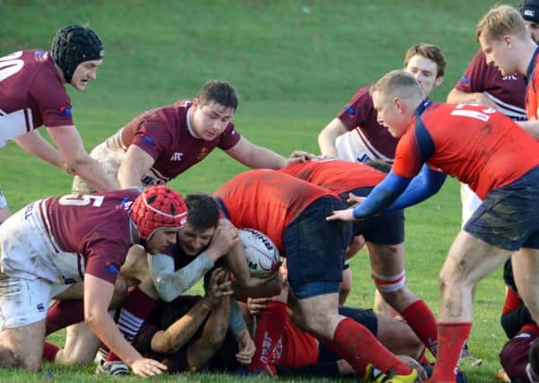 A tight tussle all the way between Gala YM, in maroon, and visitors Langholm (picture by Brian Gould).