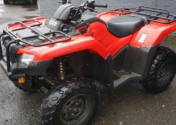 Two red Honda 420 quad bikes, like the one pictured, were stolen from properties in the Borders on Monday night.