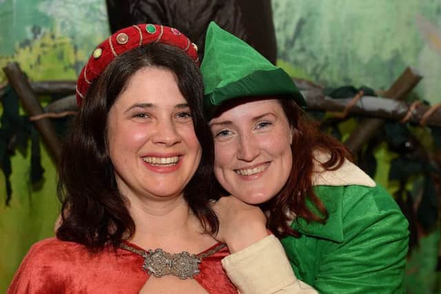 Maid Marian (Alison Crabbe) and Robin Hood (Steff Potter) share a cuddle.