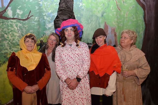 Winnie Widebottom (Donald Boyd, centre) meets up with Robin's merry men: Alan-A-Dale (Elspeth Robertson), Little John (Kate Finlayson), Will Scarlet (Kelley Robertson) and Friar Tuck (Helen Brown).