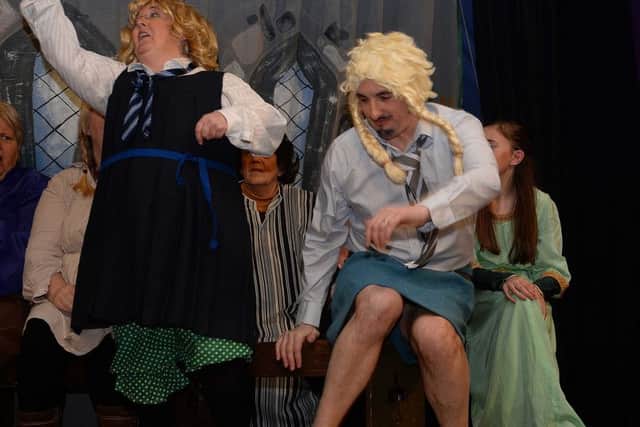 Classroom chaos with a disguised Dennis (Aileen Collings) and Sheriff (Gregor Hall).