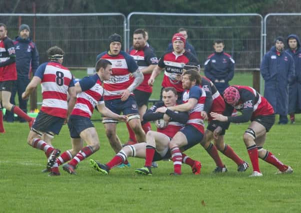 Peebles, in the short sleeves, halted Lasswade's winning sequence (picture by Bill McBurnie).