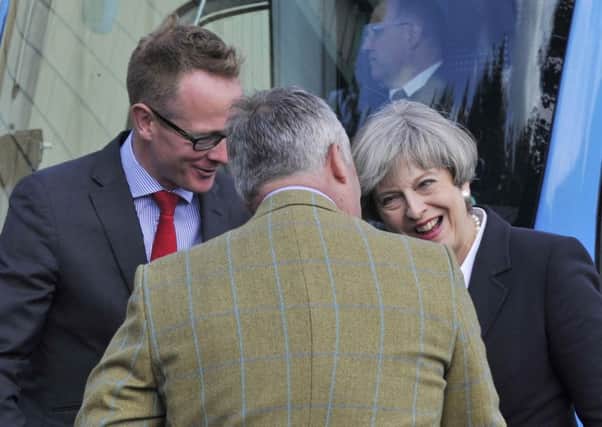 John Lamont with Prime Minister Theresa May visiting Abbey Tool and Gauge in Kelso in June last year, pictured with Abbey production manager Alistair Reid.
