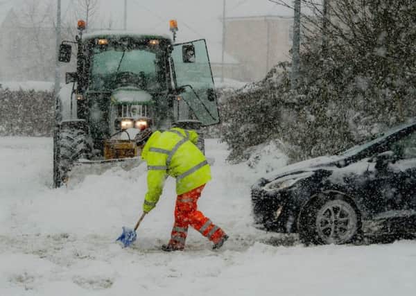 Council workmen try to clear deep snow from roads in Lauder earlier this year. Photograph by Phil Wilkinson