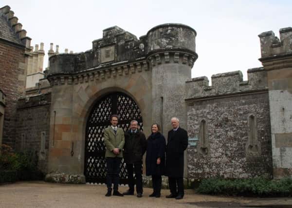 Pictured with the refurbished gate are, from left, Abbotsford chief executive Giles Ingram, renovator Charles Taylor, gardens heritage development manager Pippa Coles and Keith Smith.