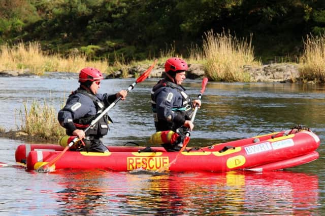 Borders Water Rescue Team use a rescue sled during training.
