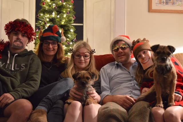 The Bells with their dogs at Christmas.