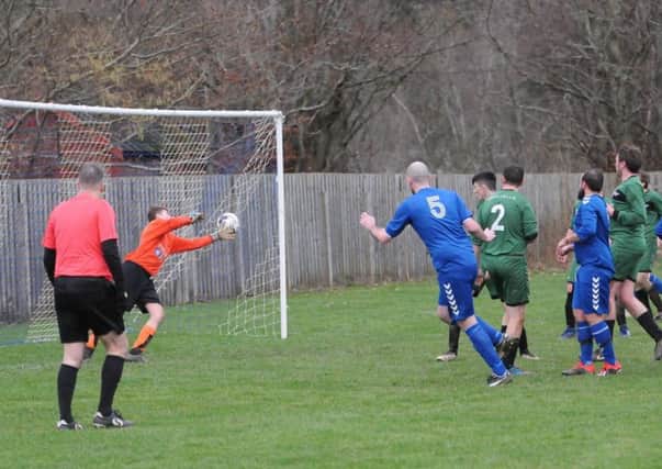 Ryan Pritchard, number five, scores for Selkirk Victoria against Hawick Legion Rovers. He and other committee colleagues are focused on creating a community football squad for Selkirk (picture by Bill McBurnie).