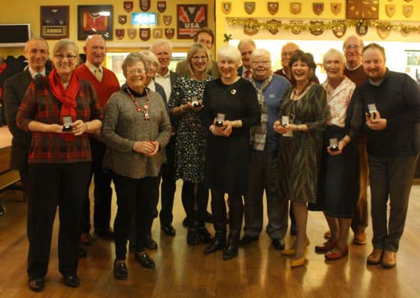 Abbotsford Trust chairman James Holloway and chief executive Giles Ingram giving  five-year service awards to volunteers Hamish Reid, Sandra Davies, Keith Crosier, Malcolm Morrison, Jack Scott, Ian Skinner, Maggie Allan, Gill Howes, Margaret Cassidy, Carole Evans, Marian Keith, Nancy Marshall, Joyce Cook and Frankie McBrier. Not pictured but also given awards were John and Margaret Collin, Simon Hemsley, Allan Herd, Derek Martin, Dawn McKenna, Mary Robertson and Linda Murray.