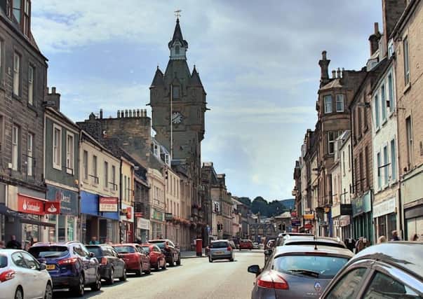 Santander's branch, on the left, in Hawick High Street.