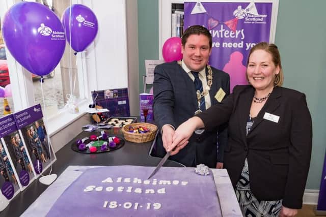 Provost Dean Weatherston from Kelso Community Council is pictured alongside Kelly Brown, locality resources co-ordinator at the Alzheimer Scotland dementia resource centre in Kelso.