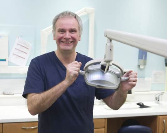 Retiring dentist Stuart Norman at Gentle Touch Dental Practice in Kelso.