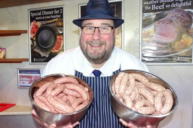 Butcher John Taylor with his new 'Fine and Dandie' sausages.