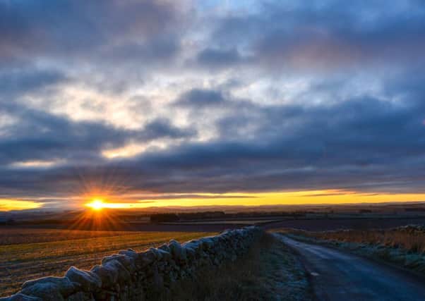 Sunrise at Smailholm, looking towards the Cheviots