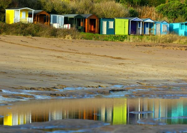 The tractor was found submerged in the bay at Coldingham and four of the beach huts were broken into. Photograph: Simon Holding