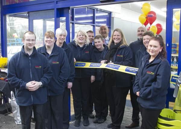 Staff at Bargain Buys Hawick at its official opening. Cutting the ribbon was manager Vicky Ballantyne, fourth from right.