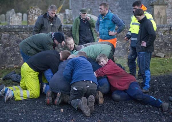 Neil Douglas in the middle of the pack at Hobkirk's hand ba'