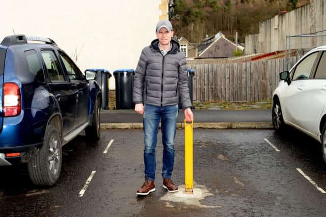 Jason Kane of Ballantyne Place, Peebles is in a dispute with the council over ownership of a parking bay.