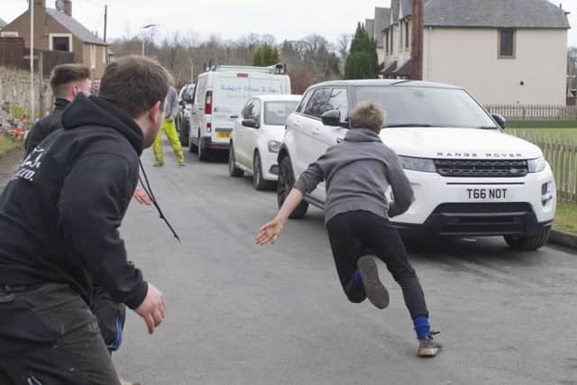 A player makes a run for it in Ancrum.