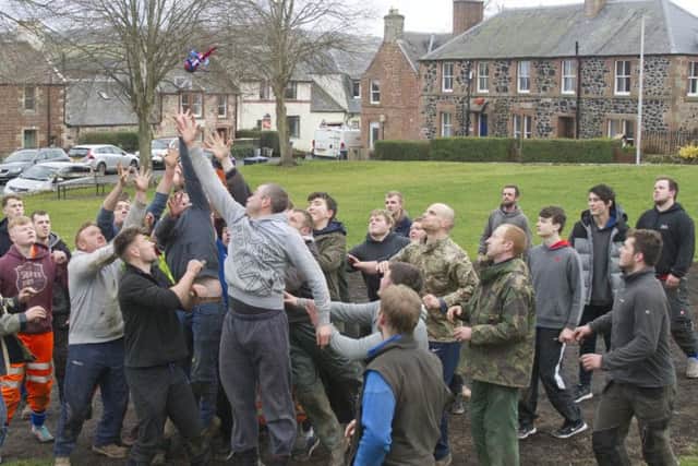 Stephen Turnbull jumping like a spring Lamb for the ba' at Ancrum.