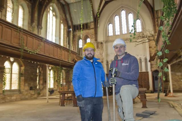 Casual worker Robbie Swinton with building owner Kirk Kirchev.