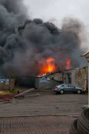 Firefighters tackling a blaze at Innerleithen's Station Yard on Wednesday, February 13.