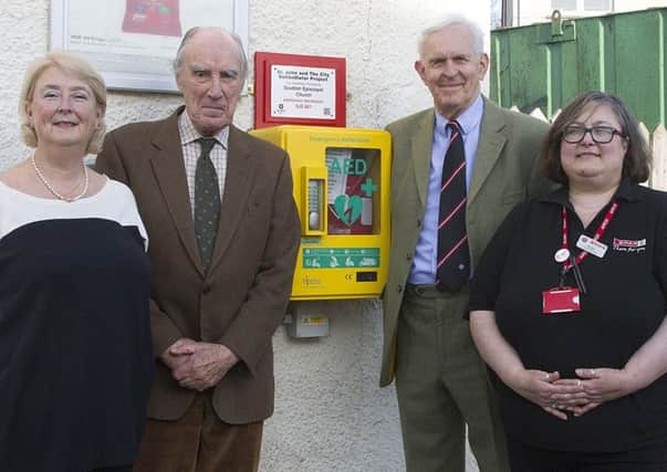 A new public access defibrillator has been installed outside the Spar store in Lothian Road, Jedburgh, thanks to a donation from charity St John Scotland. Pictured are community councillor Georgiana Craster, Graham Watt (vestry secretary for St Johns Church), Alastair Hutton and Angela Scott, from the Spar store, who will be involved in defibrillator training.