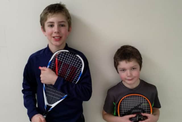 Dima Graham, left, with younger brother Sasha.