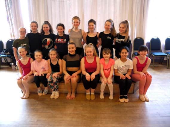 Rhiannon Moore with Elite Studio Centre dancers in Kelso.