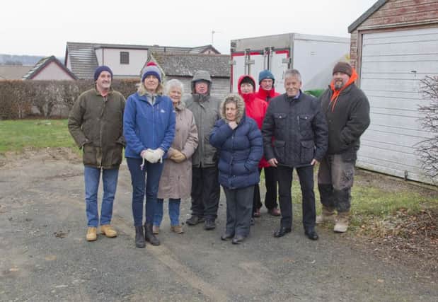 Residents unhappy about plans to demolish garages at Heriotfield, Oxton, to make way for new housing.