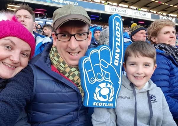 Lewis Wilson with mum Rachel and dad Darren at Murrayfield.